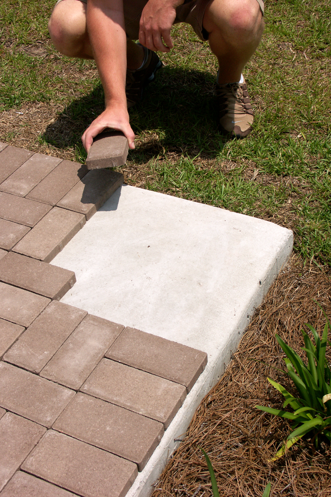 How To Properly Install 1 Pavers Over, Laying Patio Pavers On Concrete